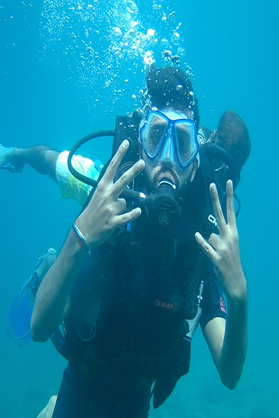 Scuba diving at Netrani Island, exploring underwater coral reefs and marine life