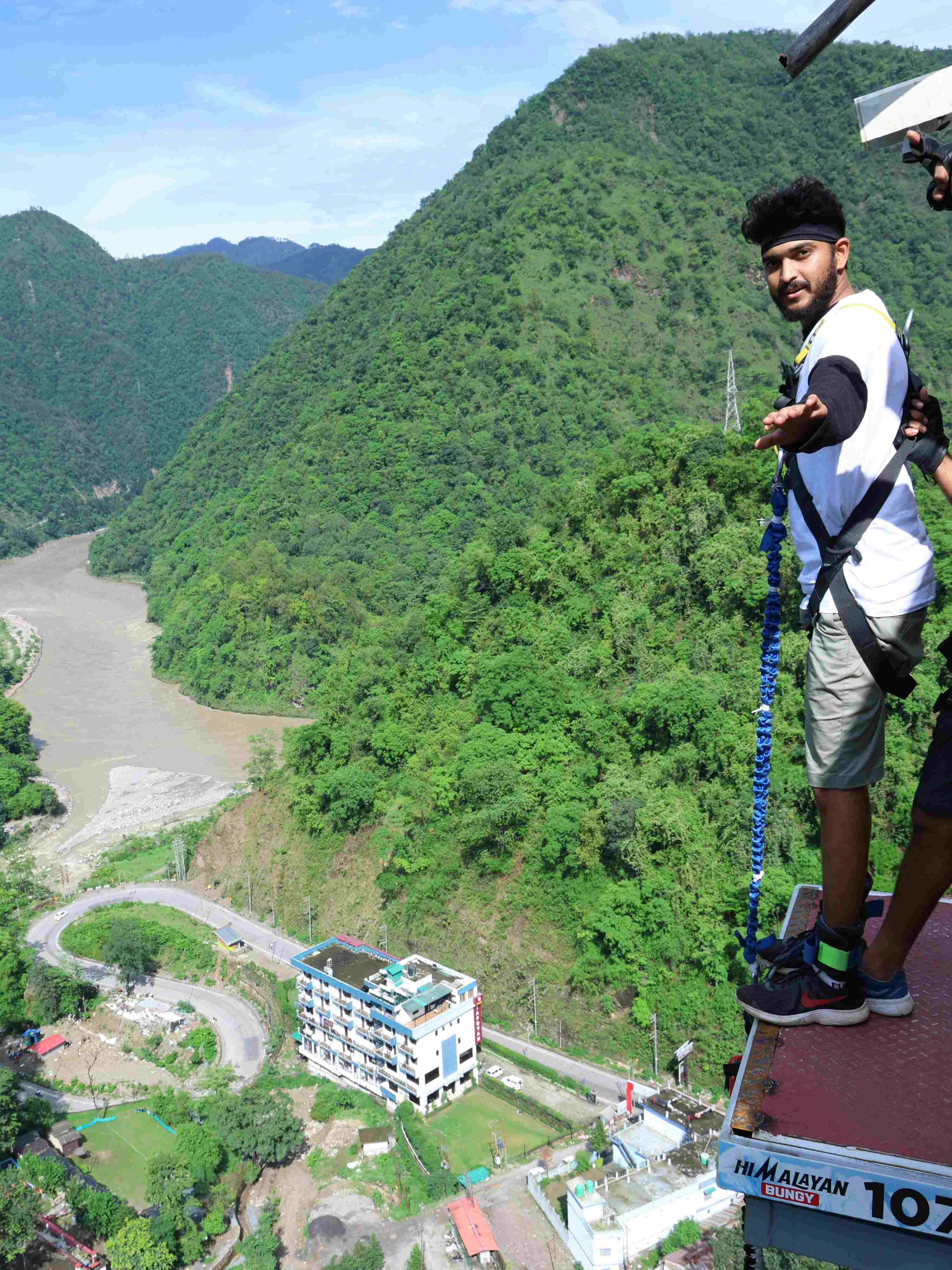 Thrilling view of the bungee jump platform at 107 meters in Rishikesh, India's highest bungee jump site with scenic surroundings