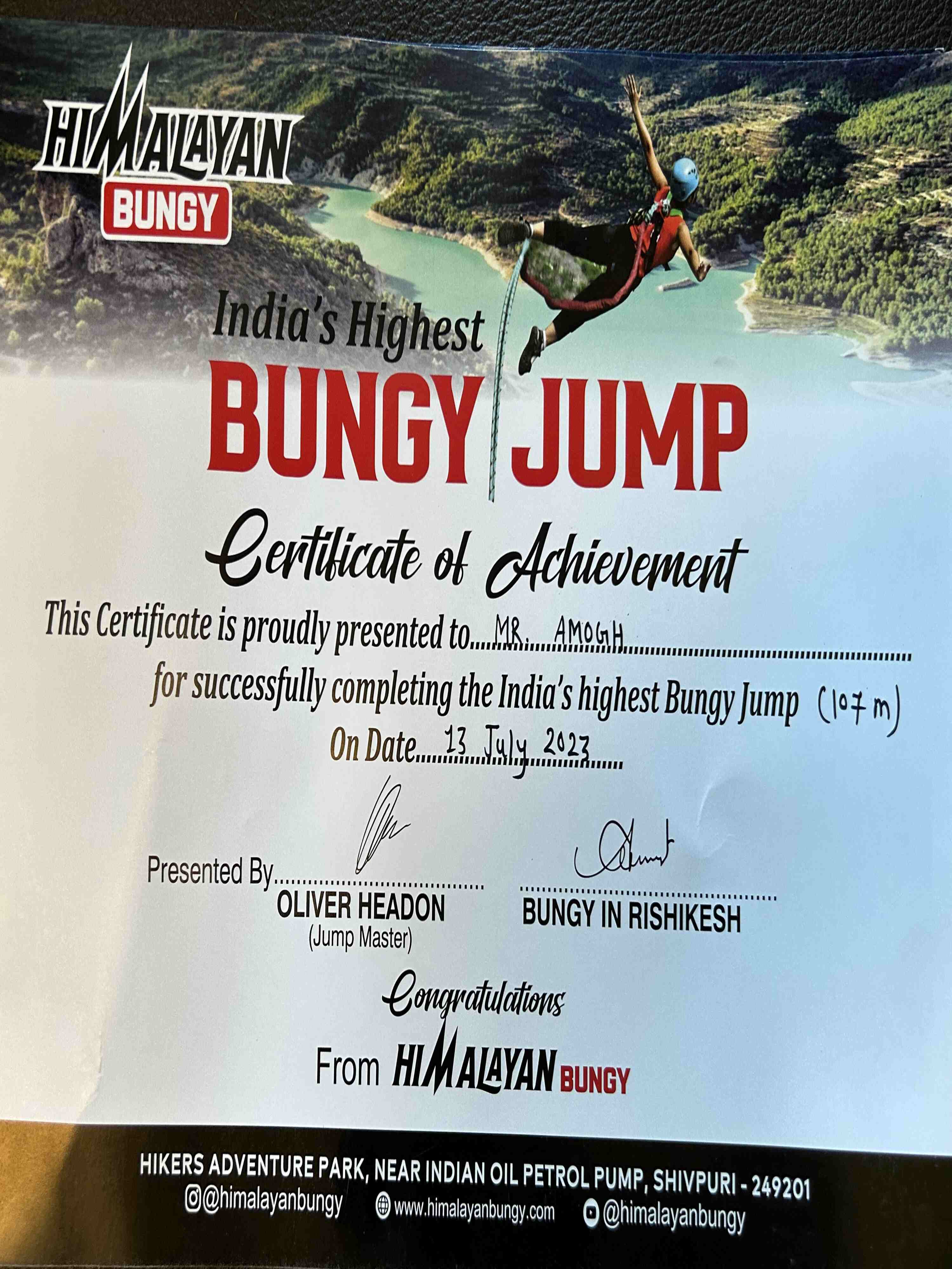Bungee jumper in mid-air during the free fall, experiencing the adrenaline rush of India's highest bungee jump