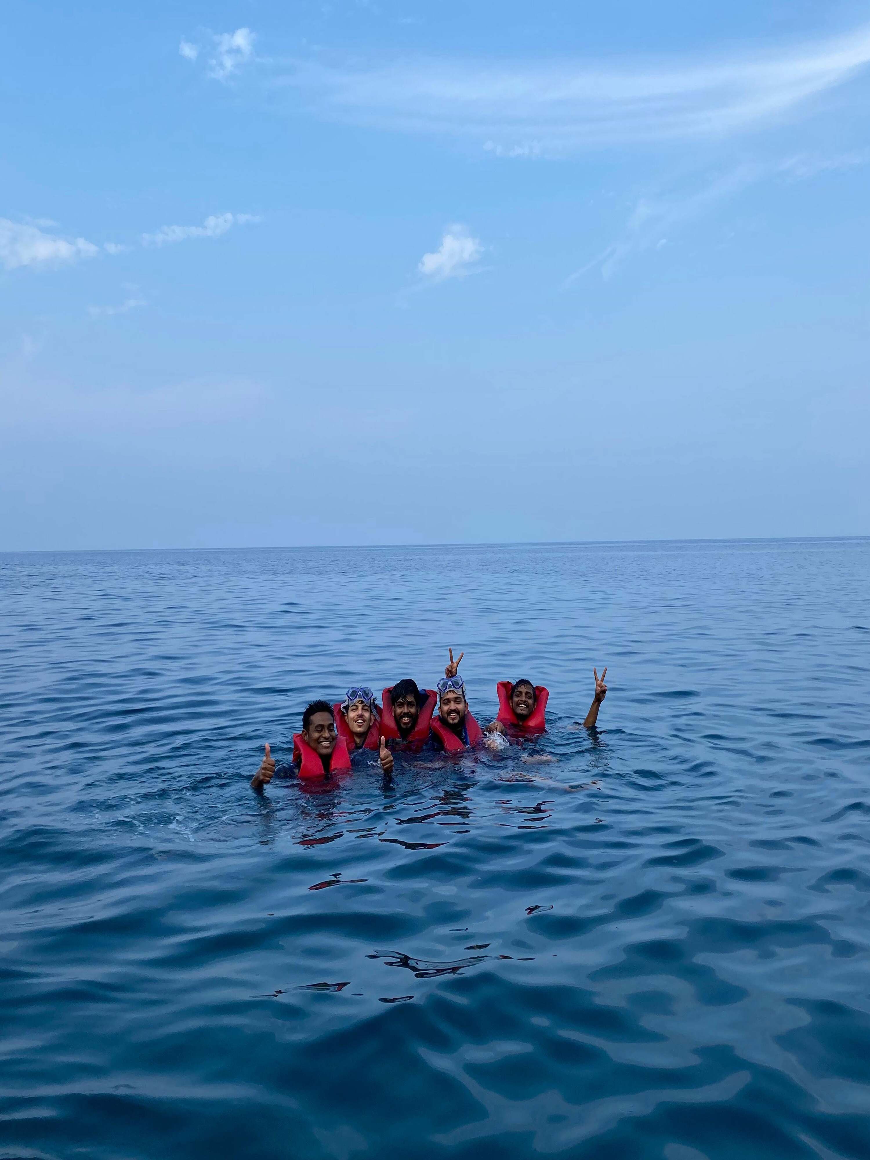 Underwater scene during scuba diving at Netrani Island, showcasing colorful fish and coral reefs