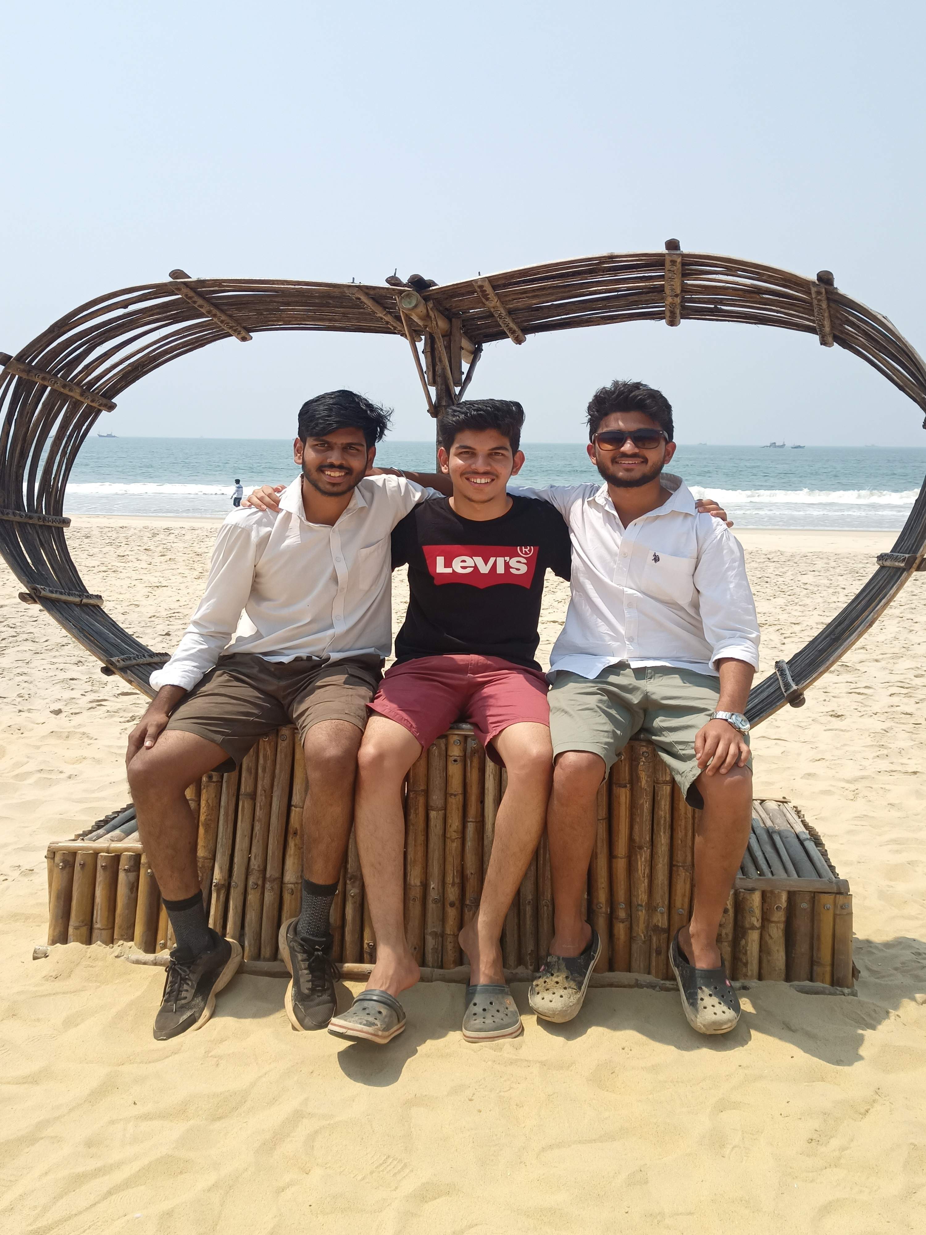 Sunlit Eco Beach with frothy waves