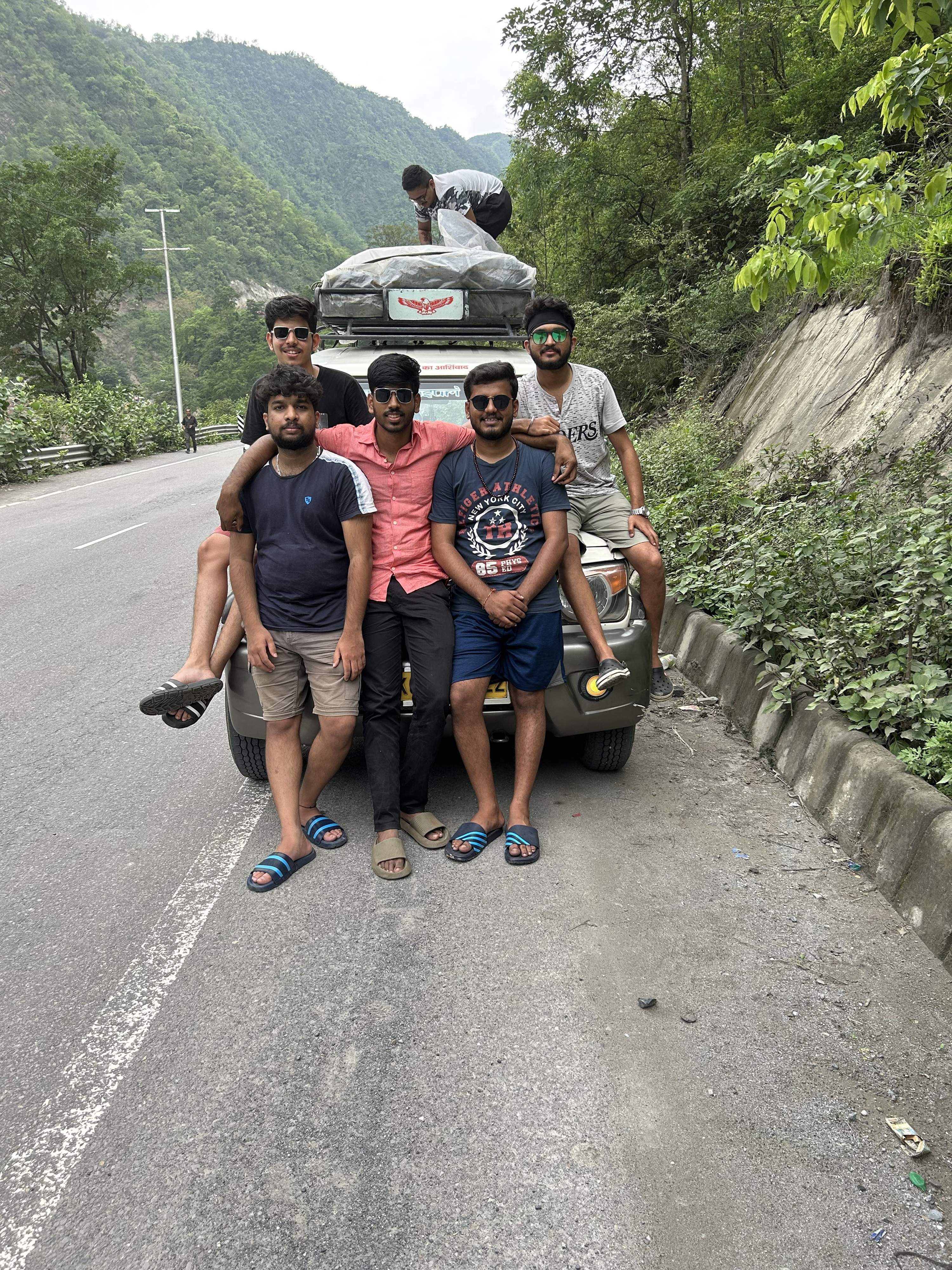Scenic landscape during monsoon season near Kedarnath, showing lush greenery and mountains