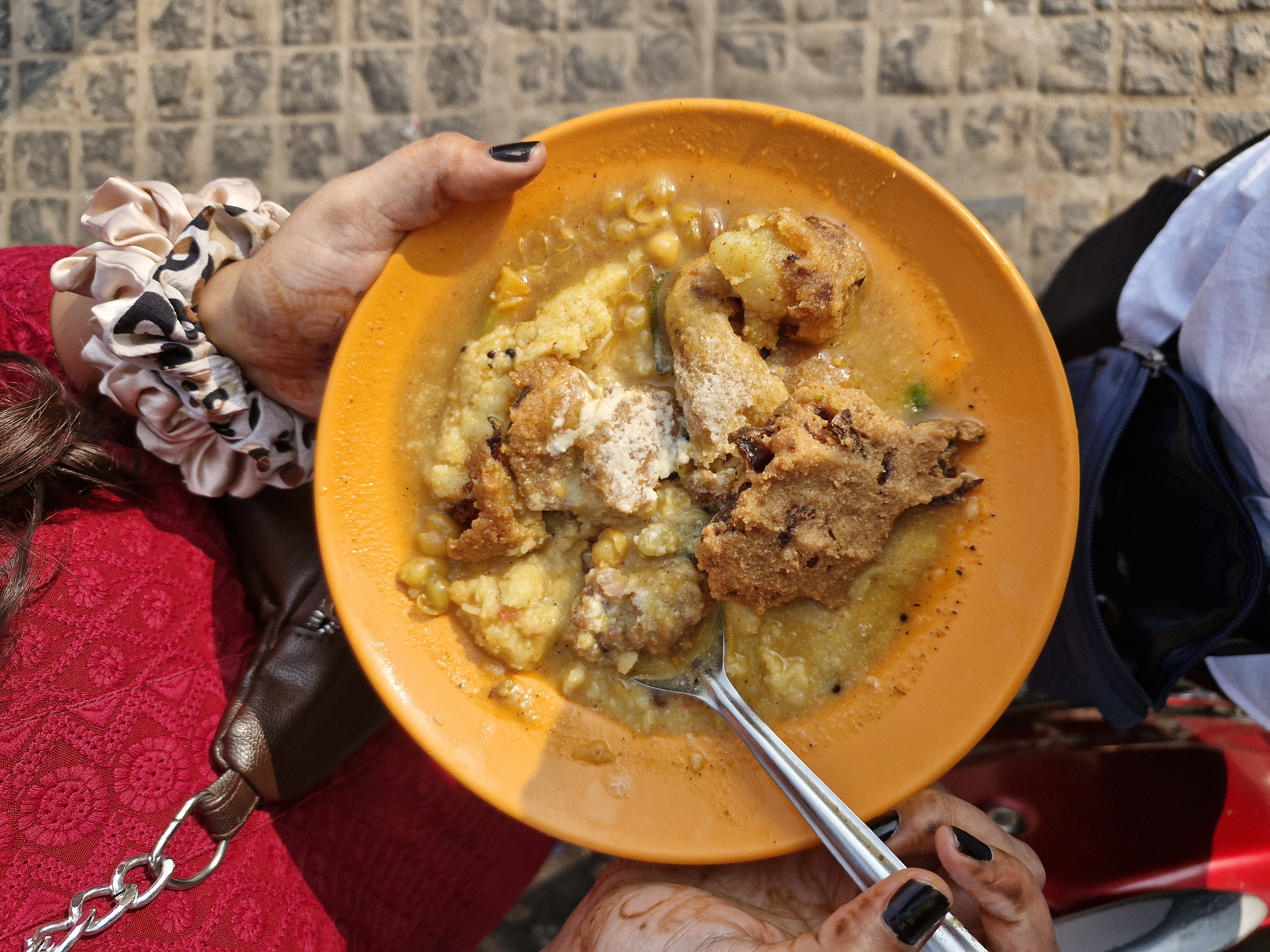 Delicious local street food in Puri including Upma Aloo Vada and Dahi Bara Aloo Dum