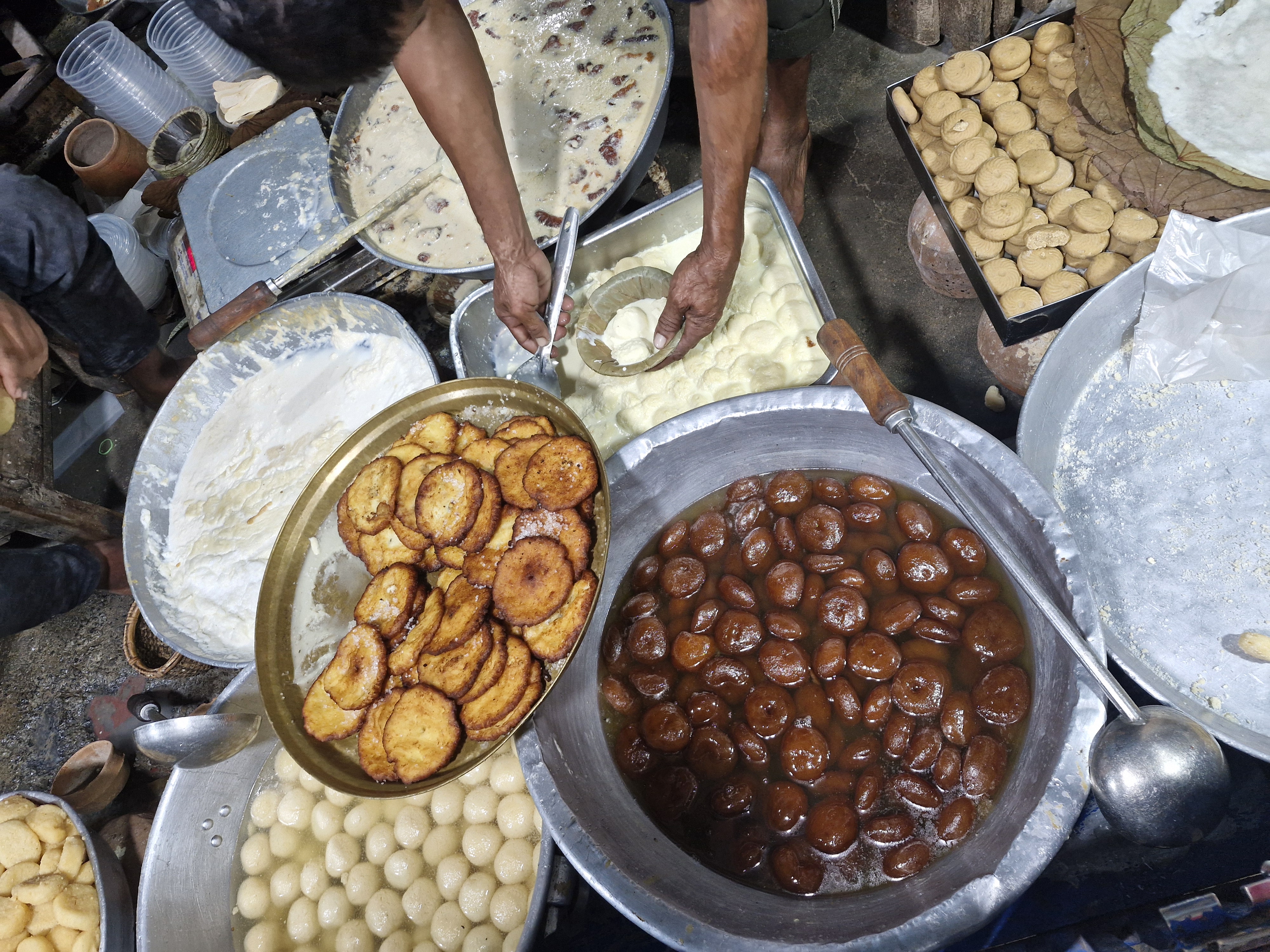 Vibrant local markets of Puri bustling with vendors selling souvenirs, seashell crafts, and street food
