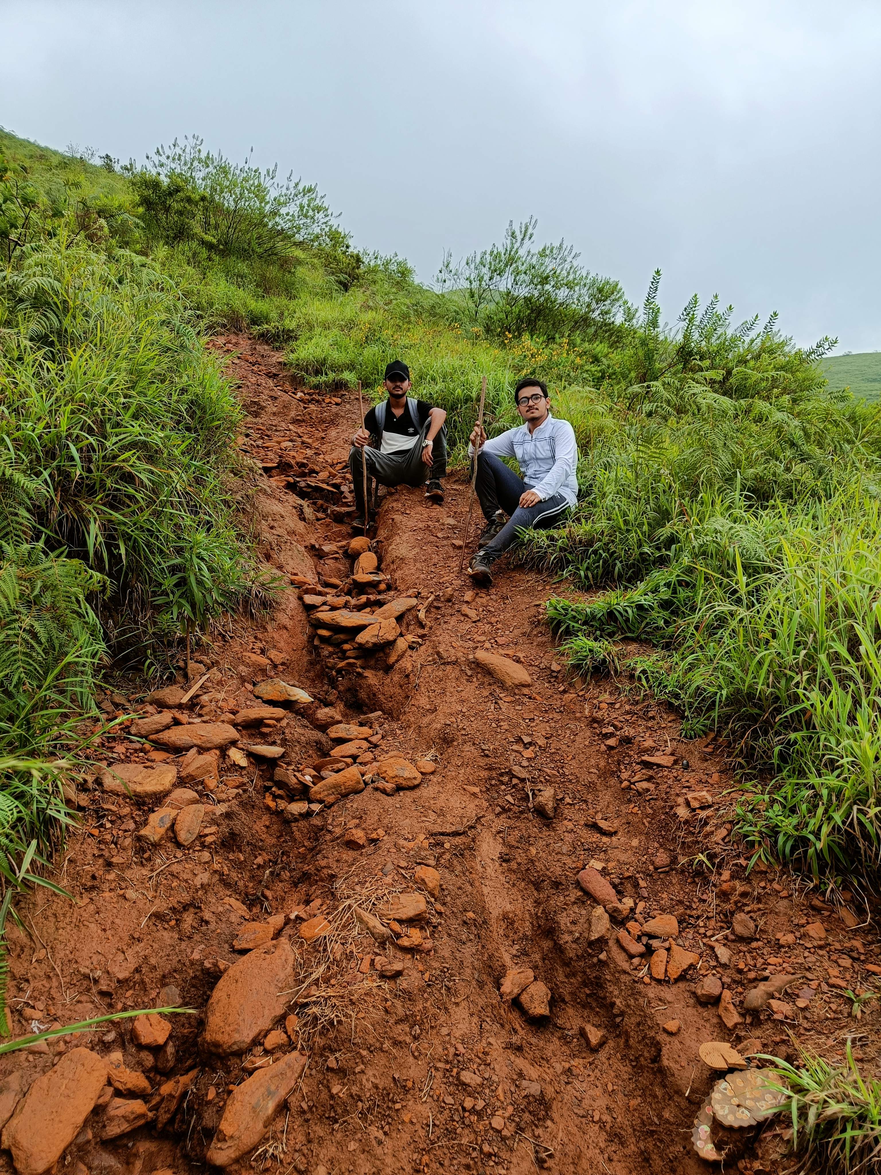 Crossing a cold stream during the Kudremukha trek
